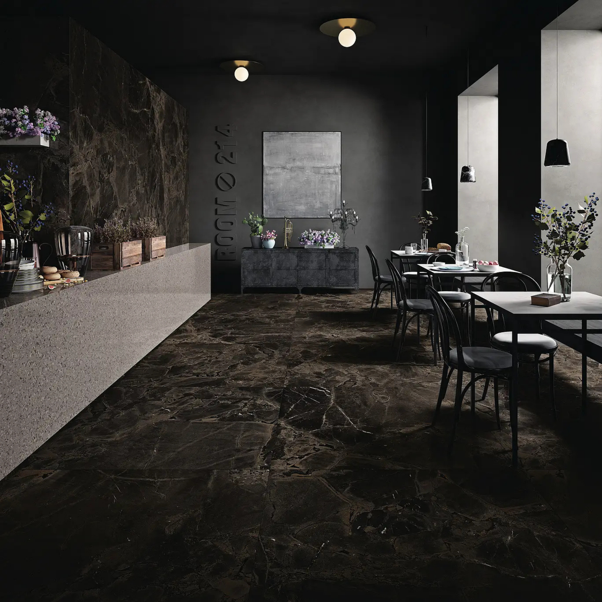 Modern restaurant interior with dark walls and patterned carpet.
