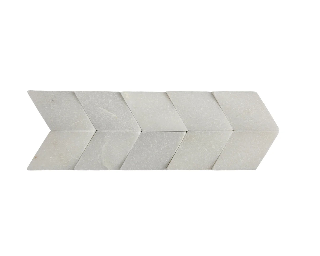 White marble chevron pattern tile on a white background