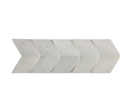 White marble chevron pattern tile on a white background